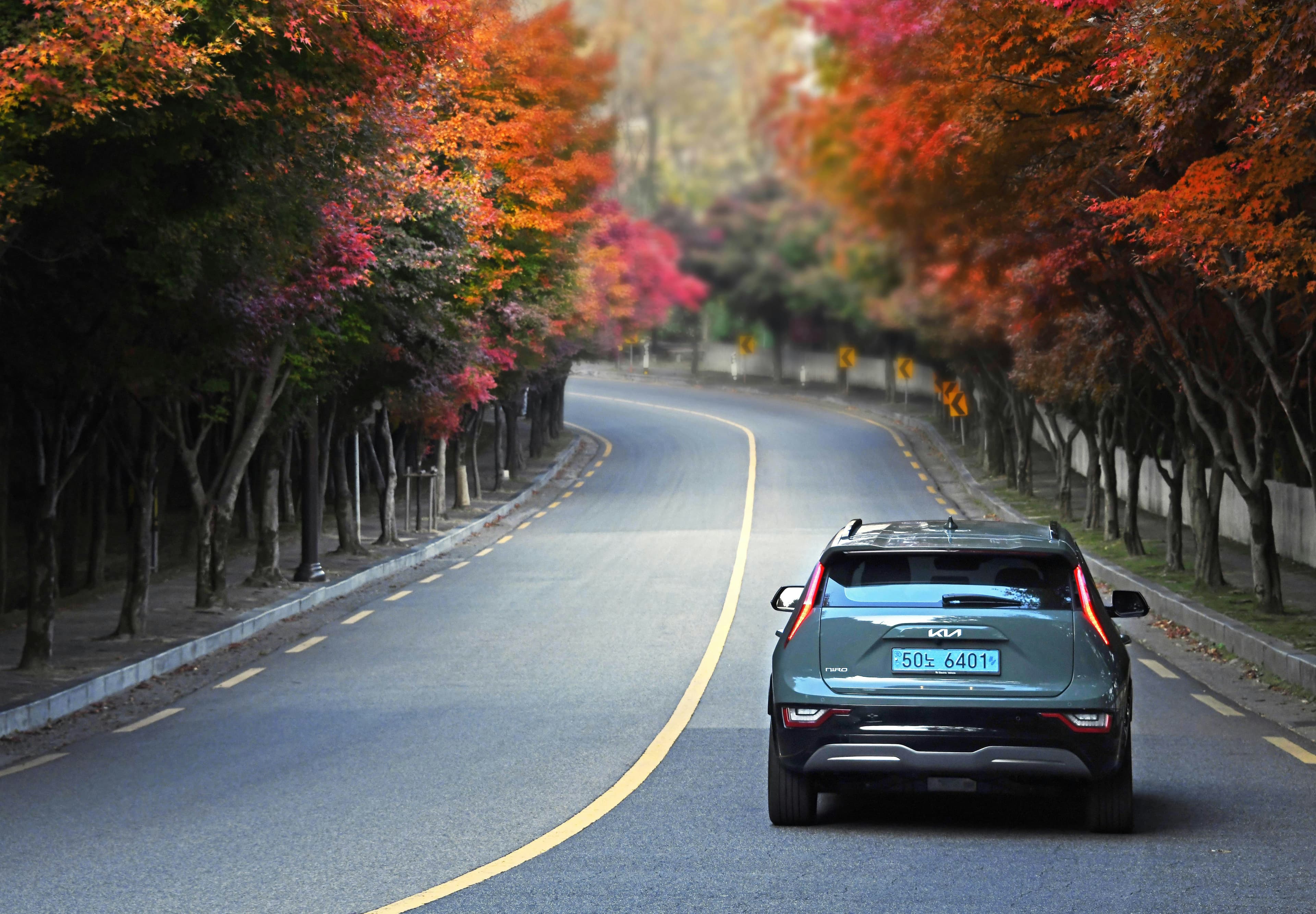 Car driving down a road